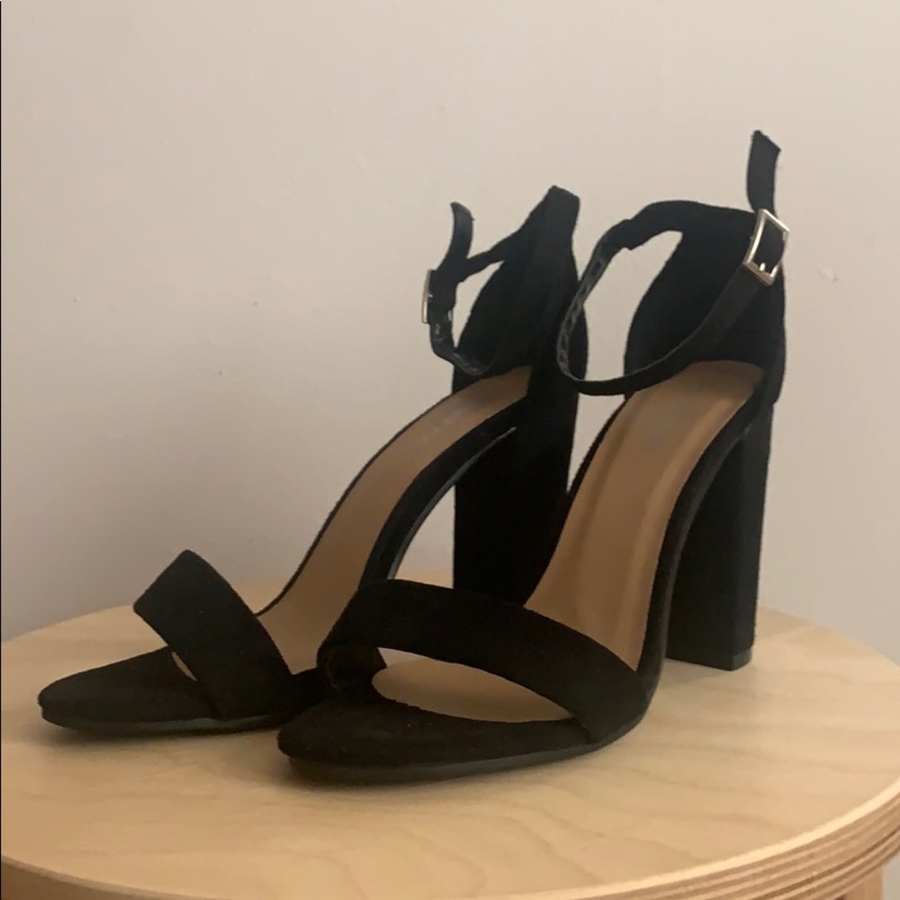 Black strap heels.